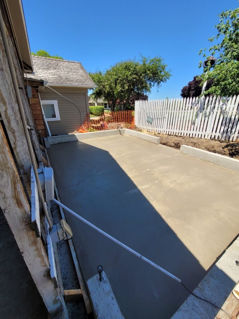 Concrete slab viewed along the side of a house