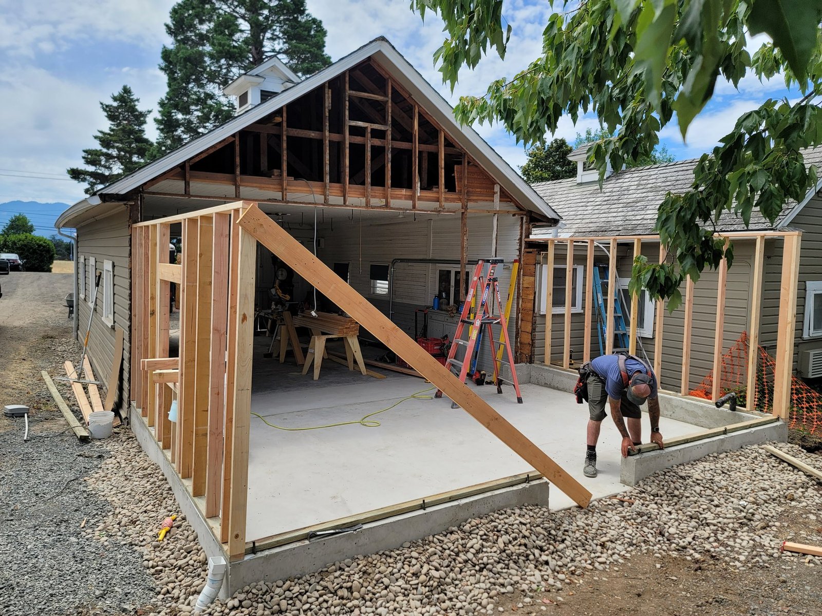 Wall framing around a slab beside an existing building