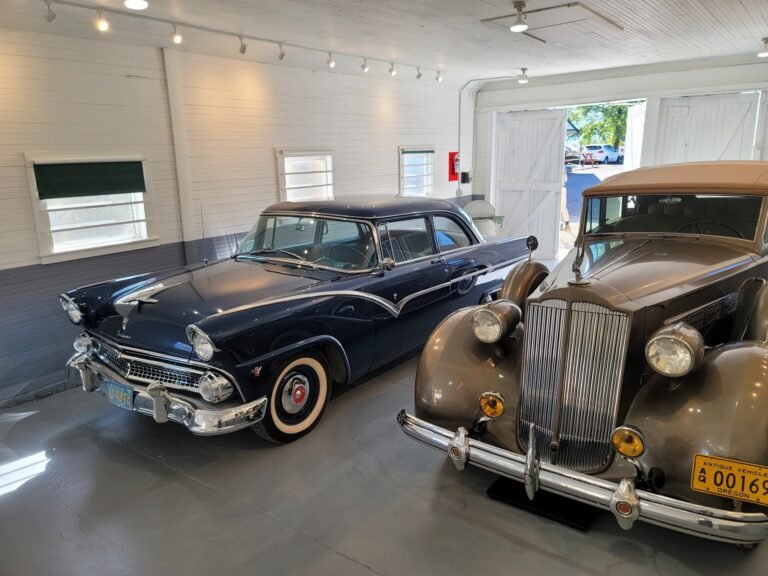 Garage interior with classic cars and finished wall surfaces