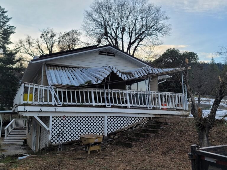 Covered deck with a collapsed roof before repair