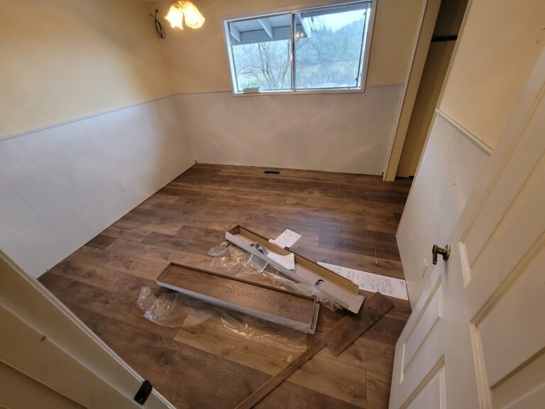 Wood-look flooring installation in progress