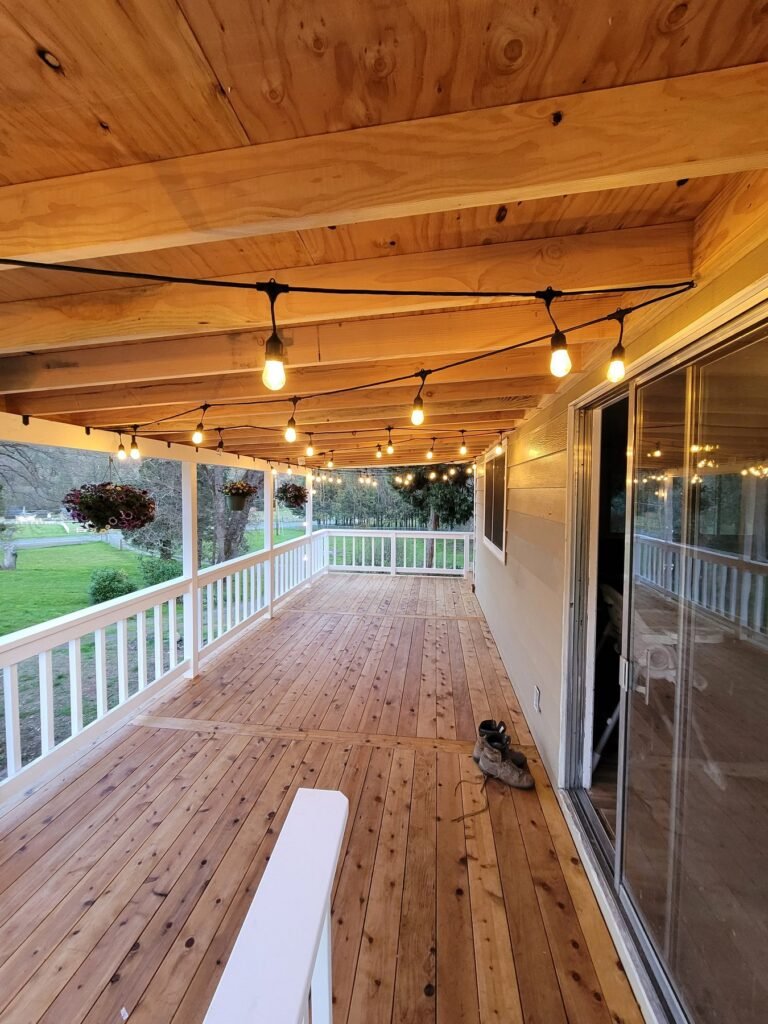 Covered porch with warm string lighting