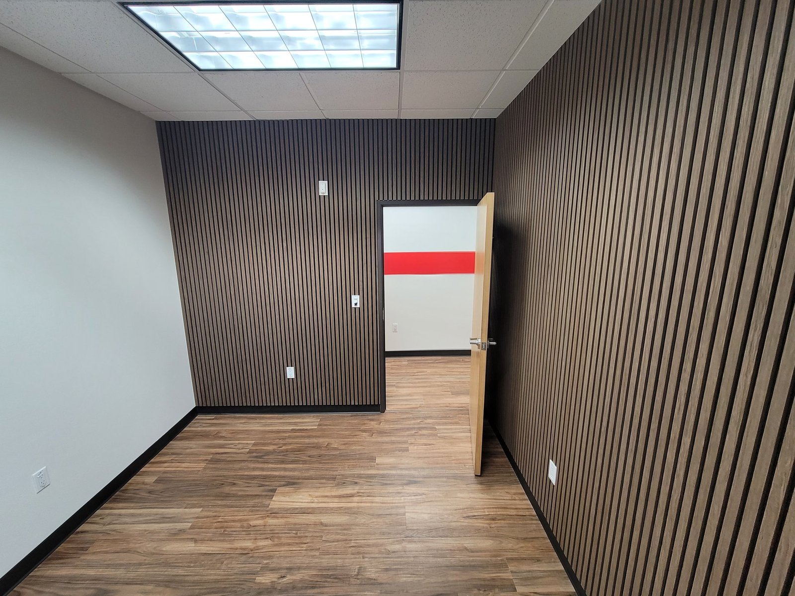 Interior room with dark vertical accent walls