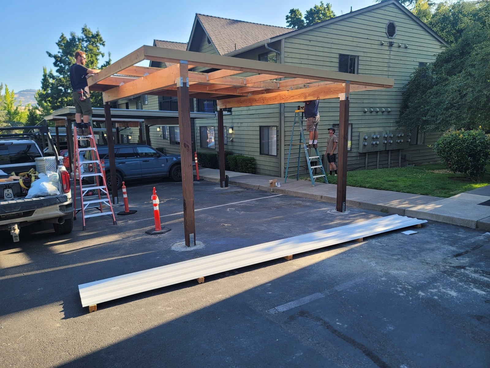 Open carport structure with timber roof framing