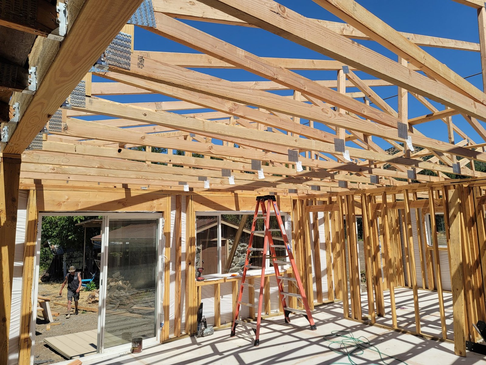 Roof framing above an open interior