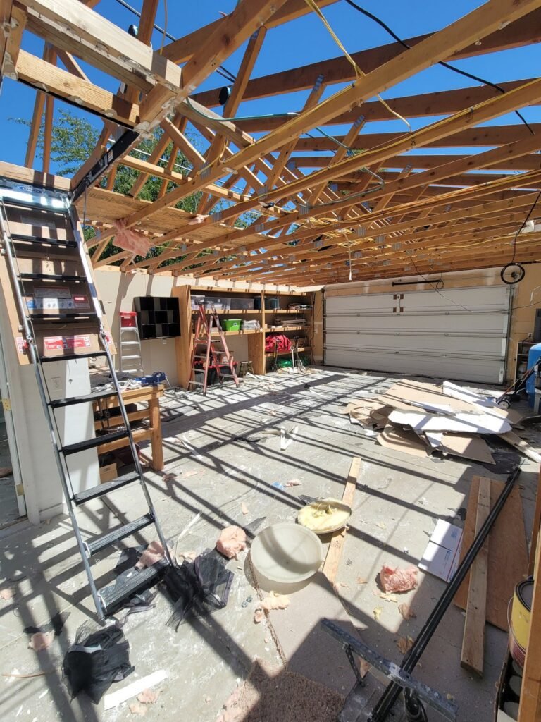 Garage with exposed roof framing during construction